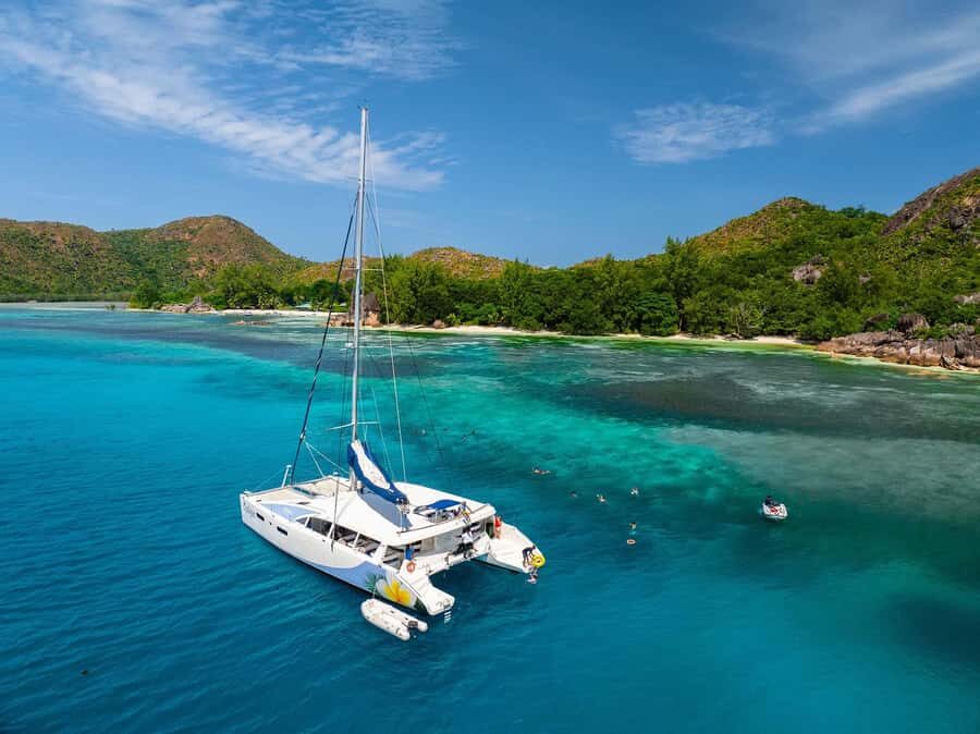 Seychelles: St Pierre and Curieuse Catamaran Tour with Lunch - Pickup, Transfers, and the La Digue Meeting Point